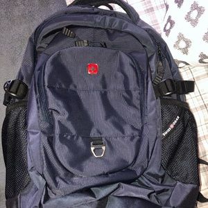 •Navy Blue Swiss Gear Backpack